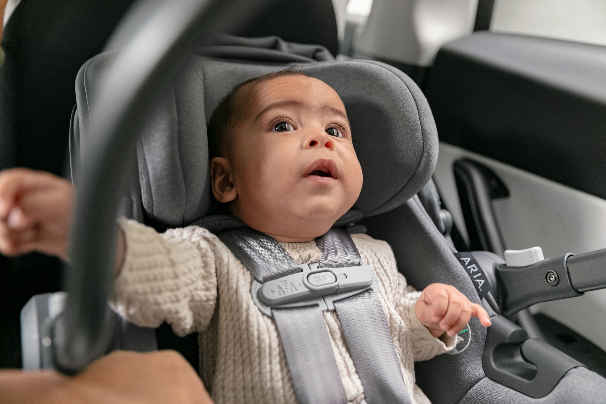 UPPAbaby Aria Infant Car Seat - Greyson (Charcoal Melange/Saddle Leather) Lifestyle 1