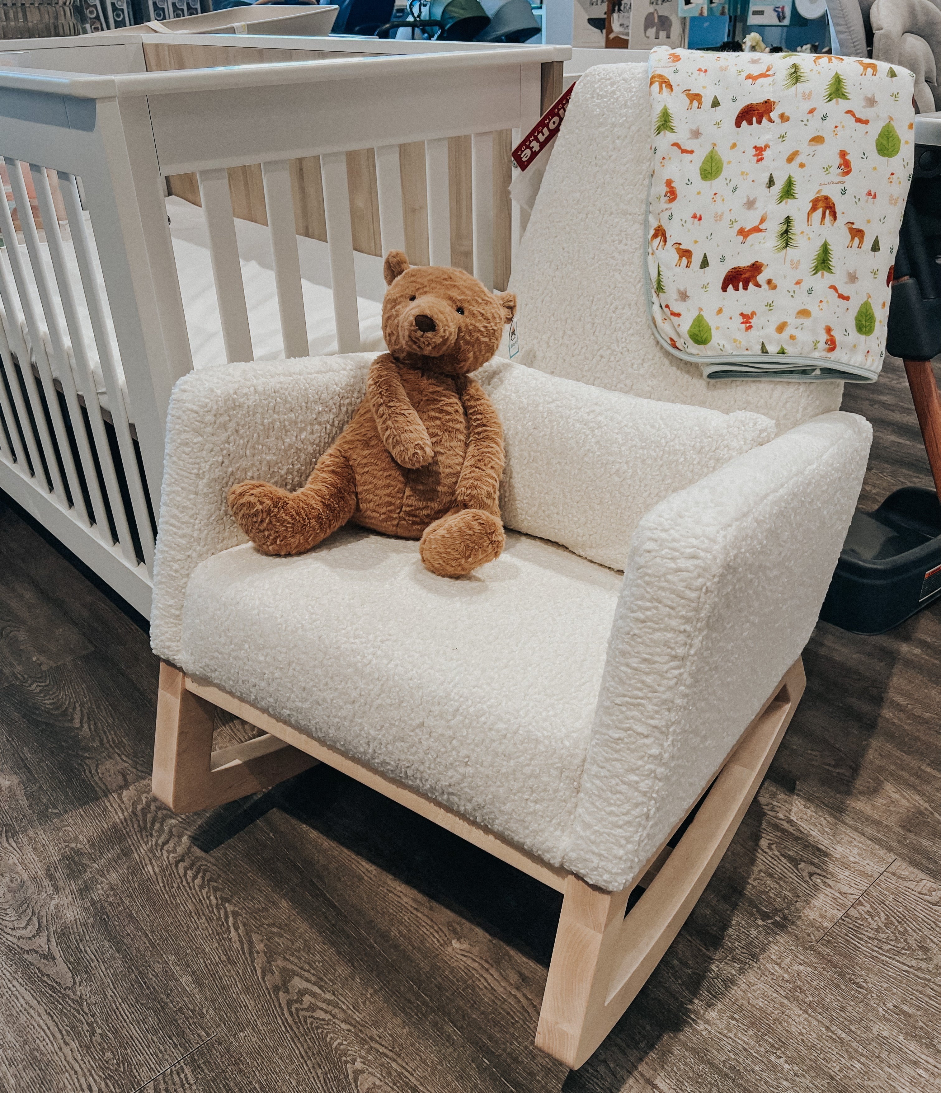 Momease must-haves top 20 baby gear image shows Monte Design Joya Rocker with Jellycat Bumbly Bear Stuffed Toy