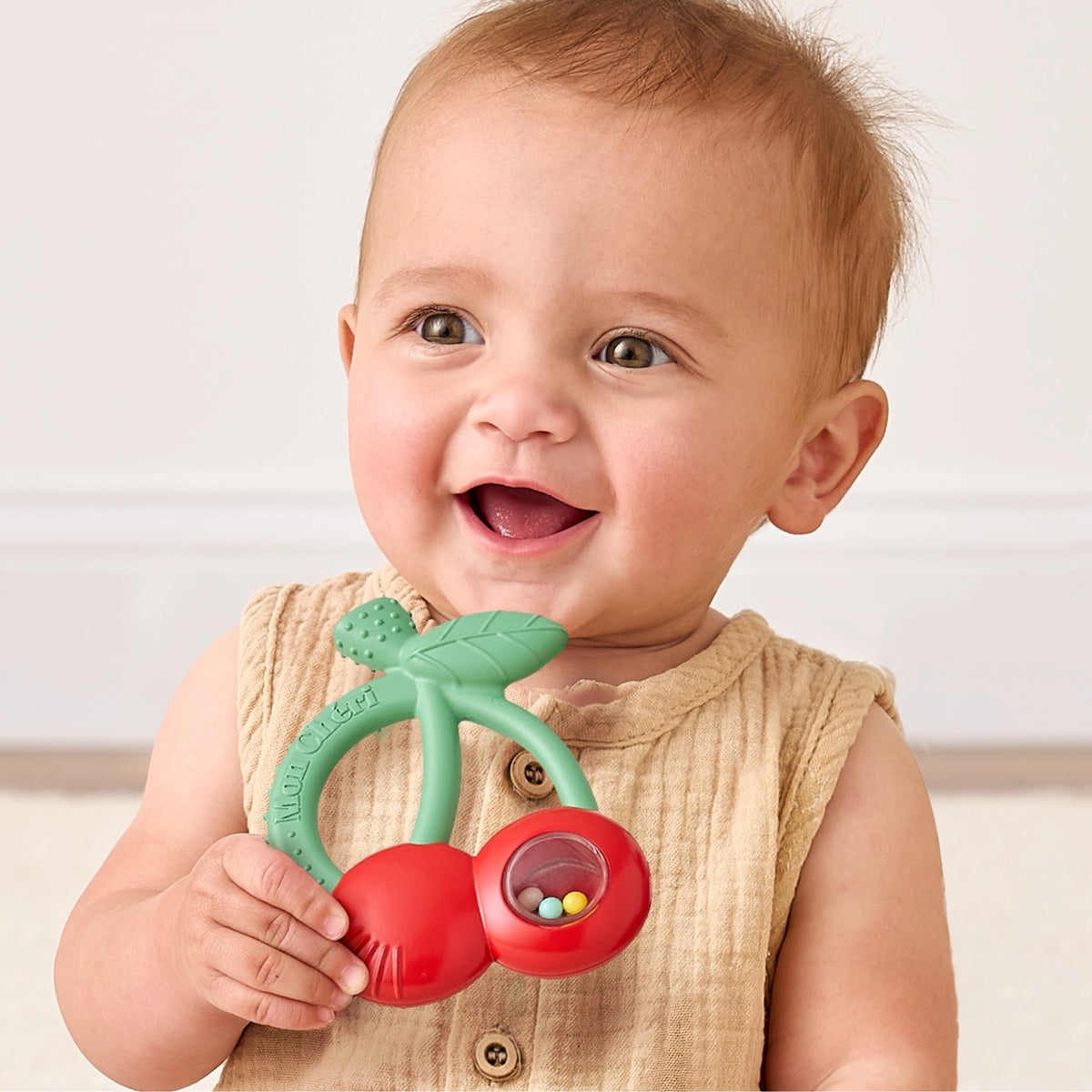 Itzy Ritzy Bitzy Shake™ Silicone Teether with Rattle - Cherries Lifestyle 1