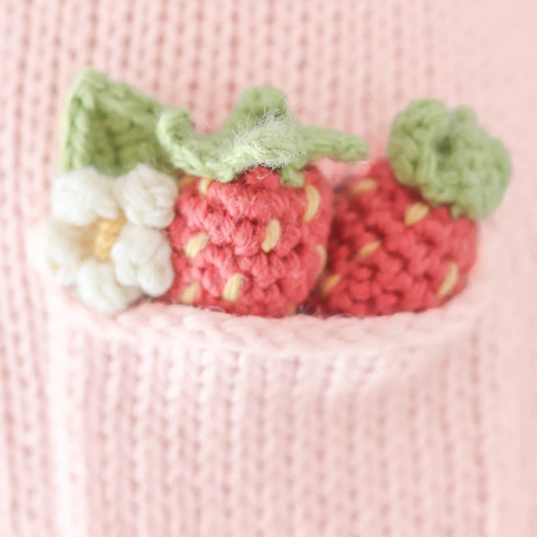 cuddle + kind Hand-Knit Doll - Ava the Cow (Powder Pink) - Strawberry Detail