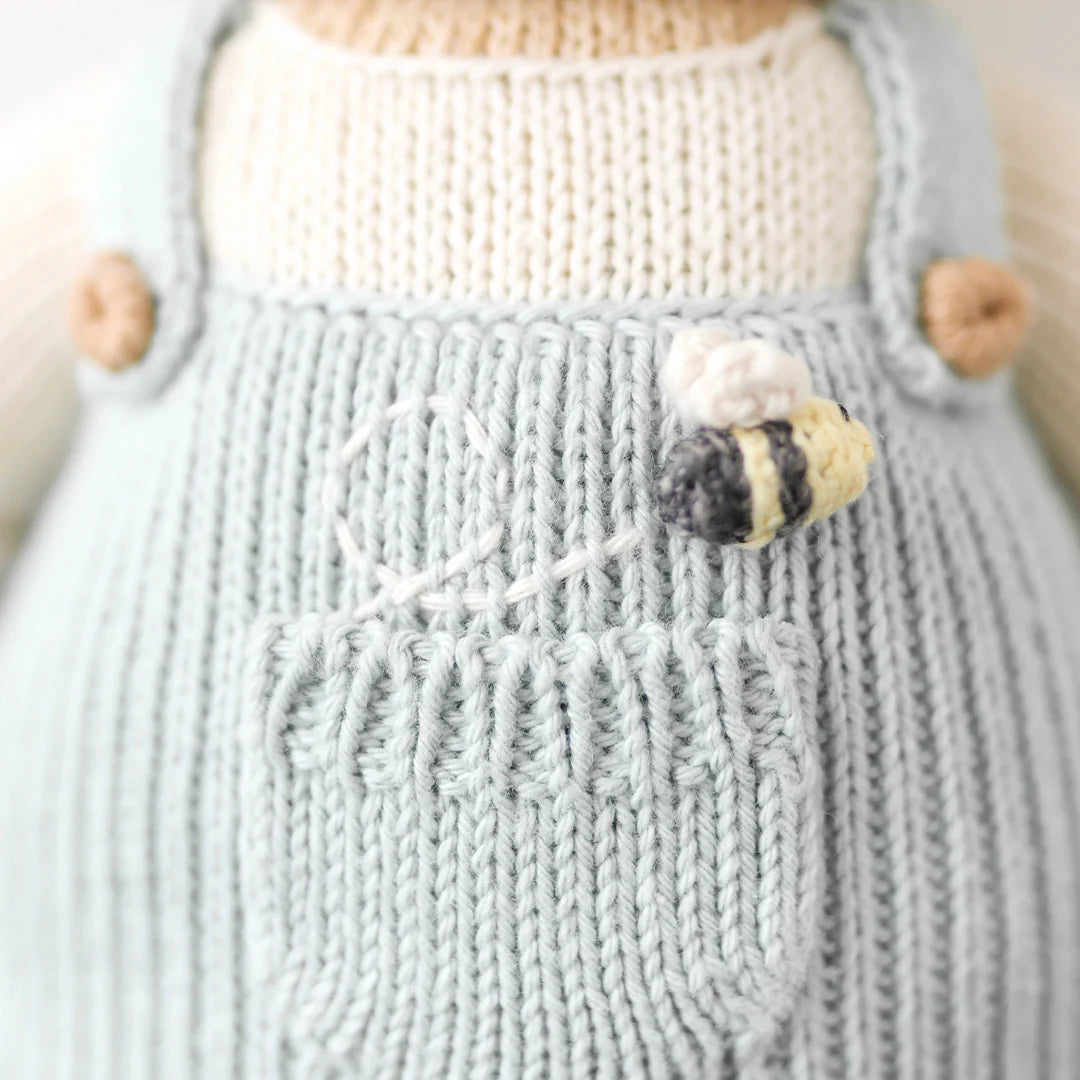 cuddle + kind Hand-Knit Doll - Charlie the Honey Bear Pocket Detail