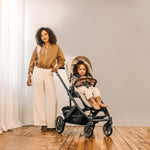 UPPAbaby Cruz V3 Stroller - Ada (Sandstone Melange | Carbon Frame | Chestnut Leather) Lifestyle