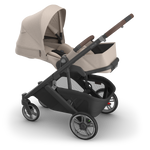 UPPAbaby Cruz V3 Stroller - Ada (Sandstone Melange | Carbon Frame | Chestnut Leather) - Side Angle Newborn Ready