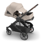 UPPAbaby Cruz V3 Stroller - Ada (Sandstone Melange | Carbon Frame | Chestnut Leather) - Side View with Extended Canopy