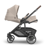 UPPAbaby Cruz V3 Stroller - Ada (Sandstone Melange | Carbon Frame | Chestnut Leather) Side View Reclined Newborn