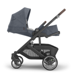UPPAbaby Cruz V3 Stroller - Julian (Dusty Blue Melange/Carbon Frame/Chestnut Leather) - Side View with Full Recline Infant Ready