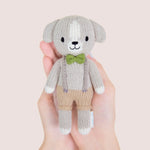 cuddle + kind Hand-Knit Tiny Collection - Noah the Dog Size Detail In Hand