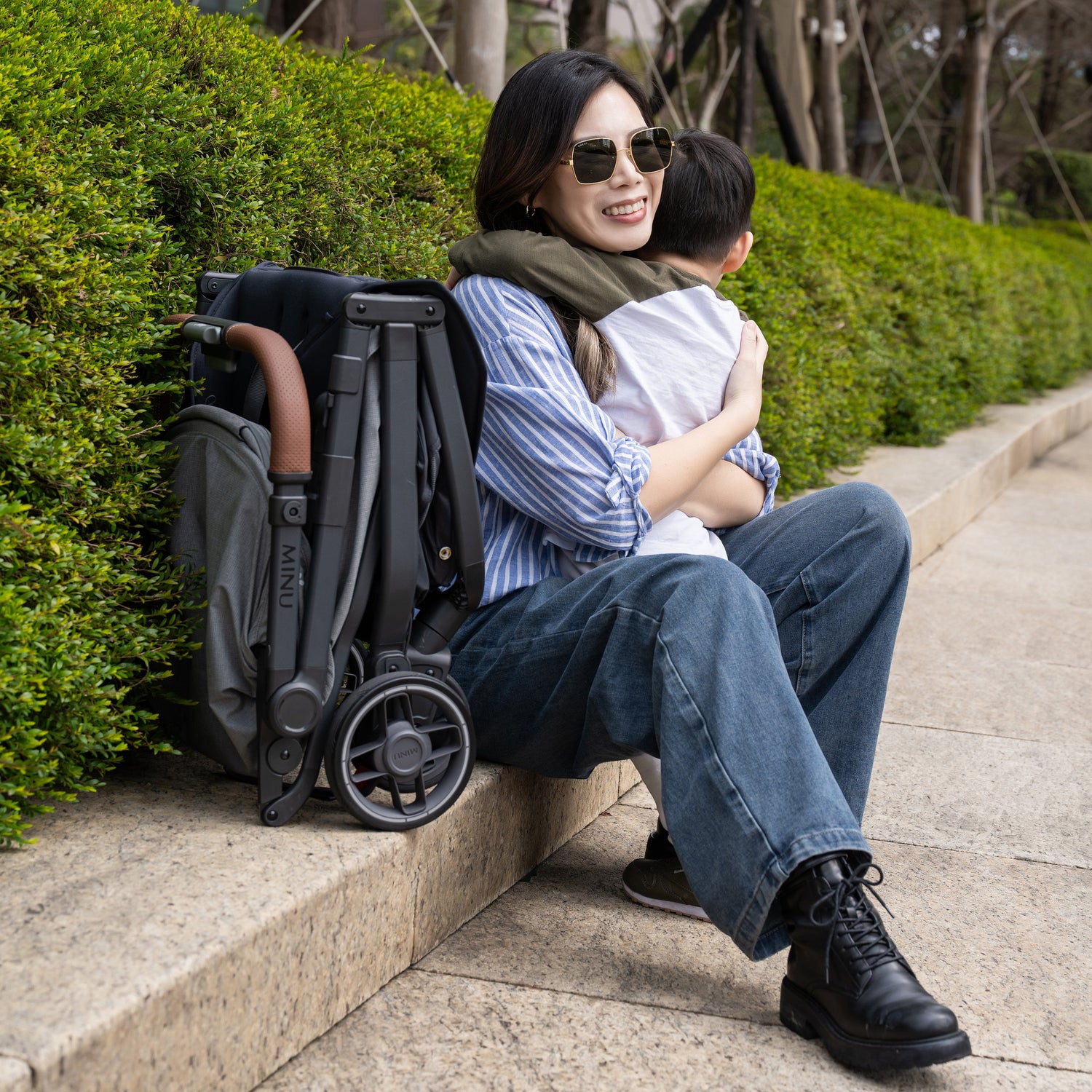 UPPAbaby Minu V3 Stroller - Greyson (Charcoal Melange/Carbon/Saddle Leather) - Lifestyle 2