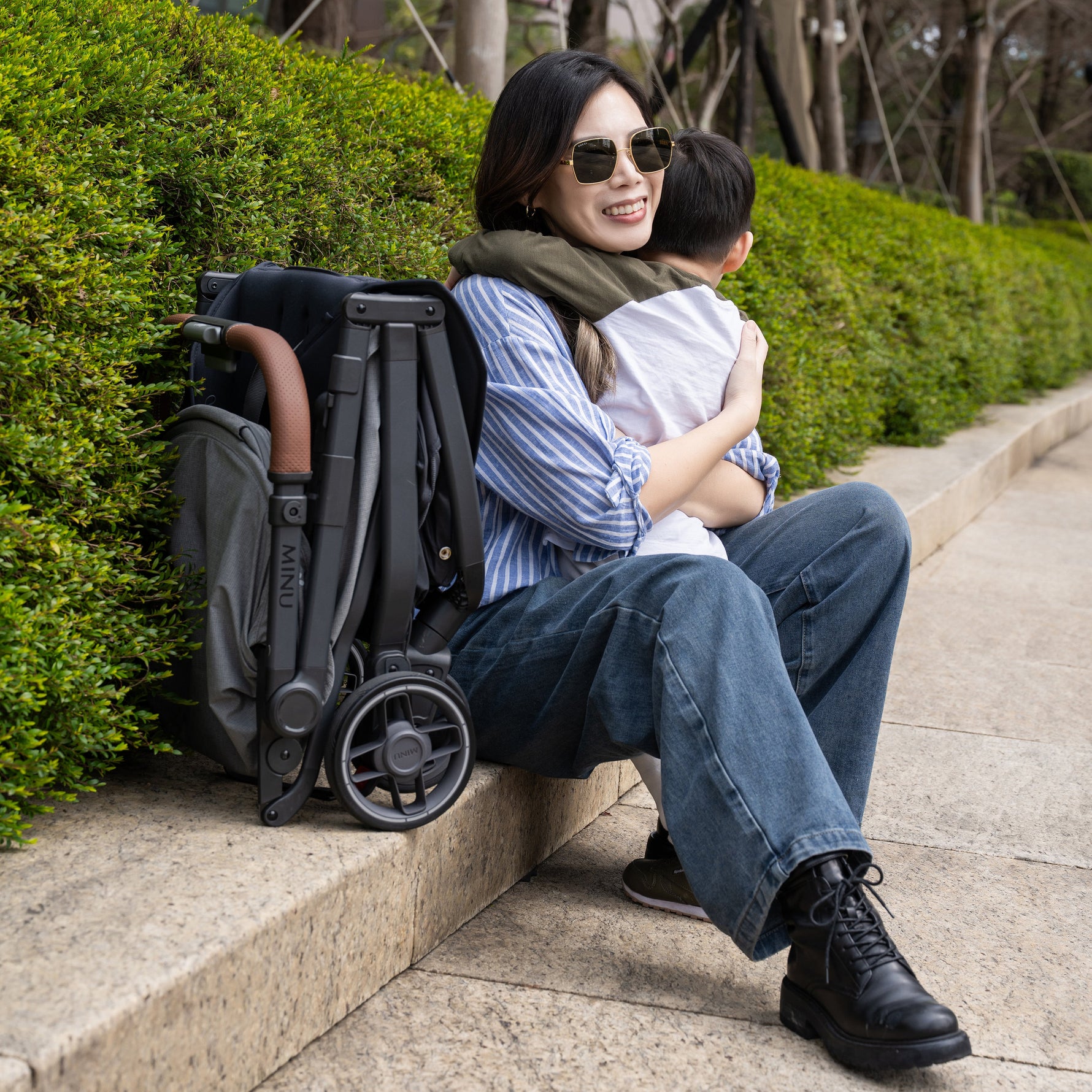 UPPAbaby Minu V3 Stroller - Greyson (Charcoal Melange/Carbon/Saddle Leather) - Lifestyle 2
