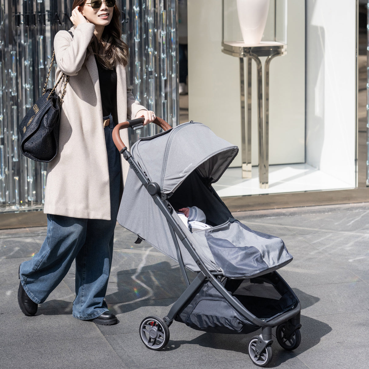UPPAbaby Minu V3 Stroller - Greyson (Charcoal Melange/Carbon/Saddle Leather) - Lifestyle 1
