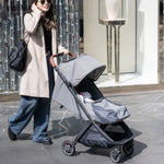 UPPAbaby Minu V3 Stroller - Greyson (Charcoal Melange/Carbon/Saddle Leather) - Lifestyle 1