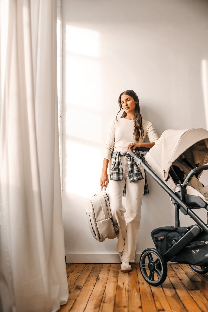 UPPAbaby Cruz V3 Stroller - Ada (Sandstone Melange | Carbon Frame | Chestnut Leather) Lifestyle 2