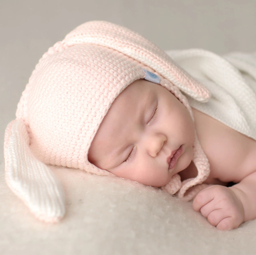 Beba Bean Crochet Bunny Hat - Pink Toque Lifestyle with sleeping baby