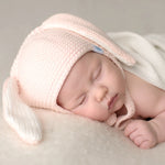 Beba Bean Crochet Bunny Hat - Pink Toque Lifestyle with sleeping baby