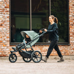 Thule Urban Glide 3 Single All-Terrain Stroller - Mist Green Lifestyle 2