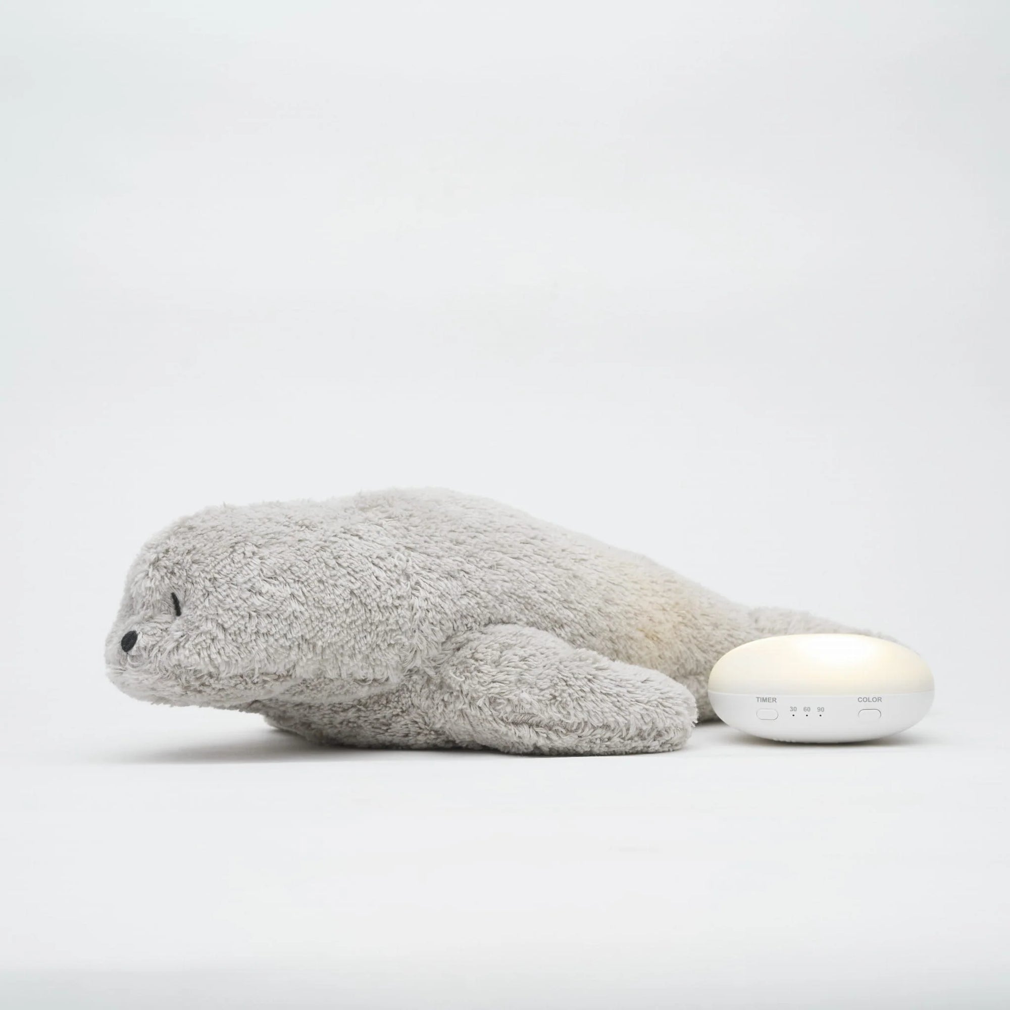 MOONIE Organic Humming Seal with Lamp -Grey Side Angle View