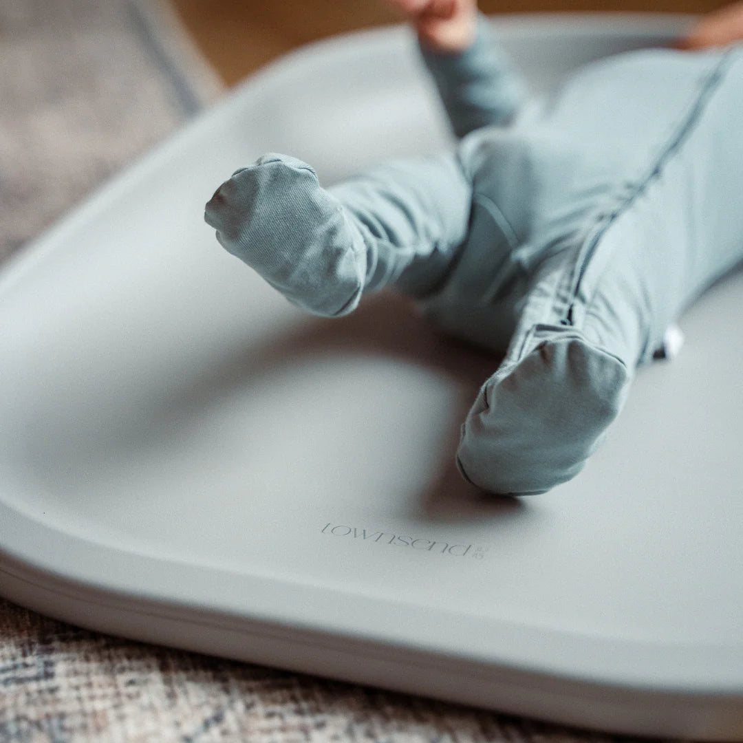 Townsend Avenue Contoured Foam Changing Pad - Dove Grey Lifestyle 1