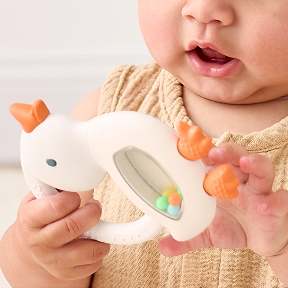 Itzy Ritzy Bitzy Shake™ Silicone Teether with Rattle - Goose Lifestyle 1