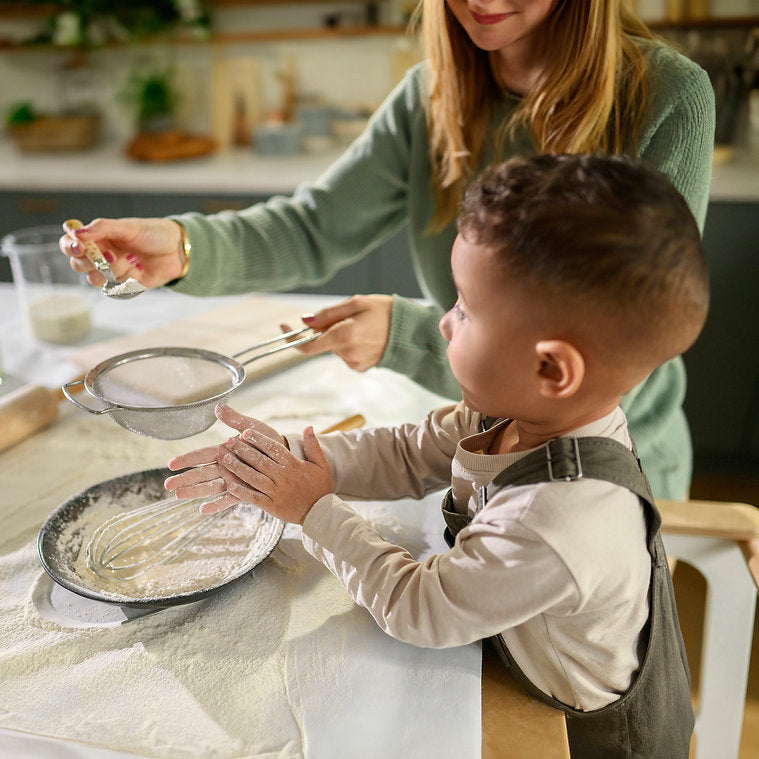Maxi-Cosi Toucan Learning Tower - Natural White Lifestyle Helping Cook in the Kitchen