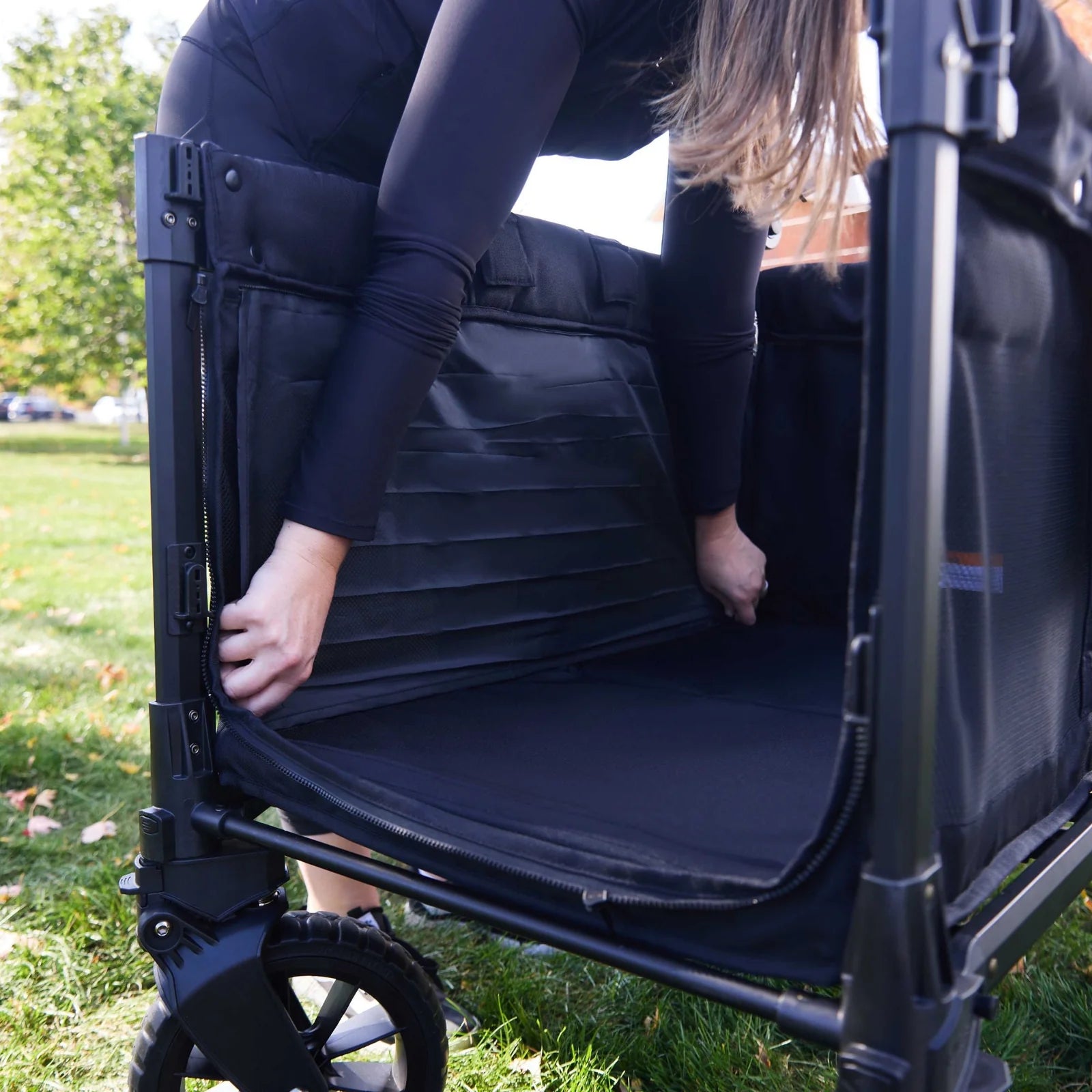WonderFold W4 Luxe PRO Quad Stroller Wagon - Jet Black Lifestyle 7