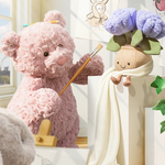 Jellycat Leola Bear with Bashful Cream Bunny Plant, Amuseables Ivy and Amuseables Hydrangea in an art room painting