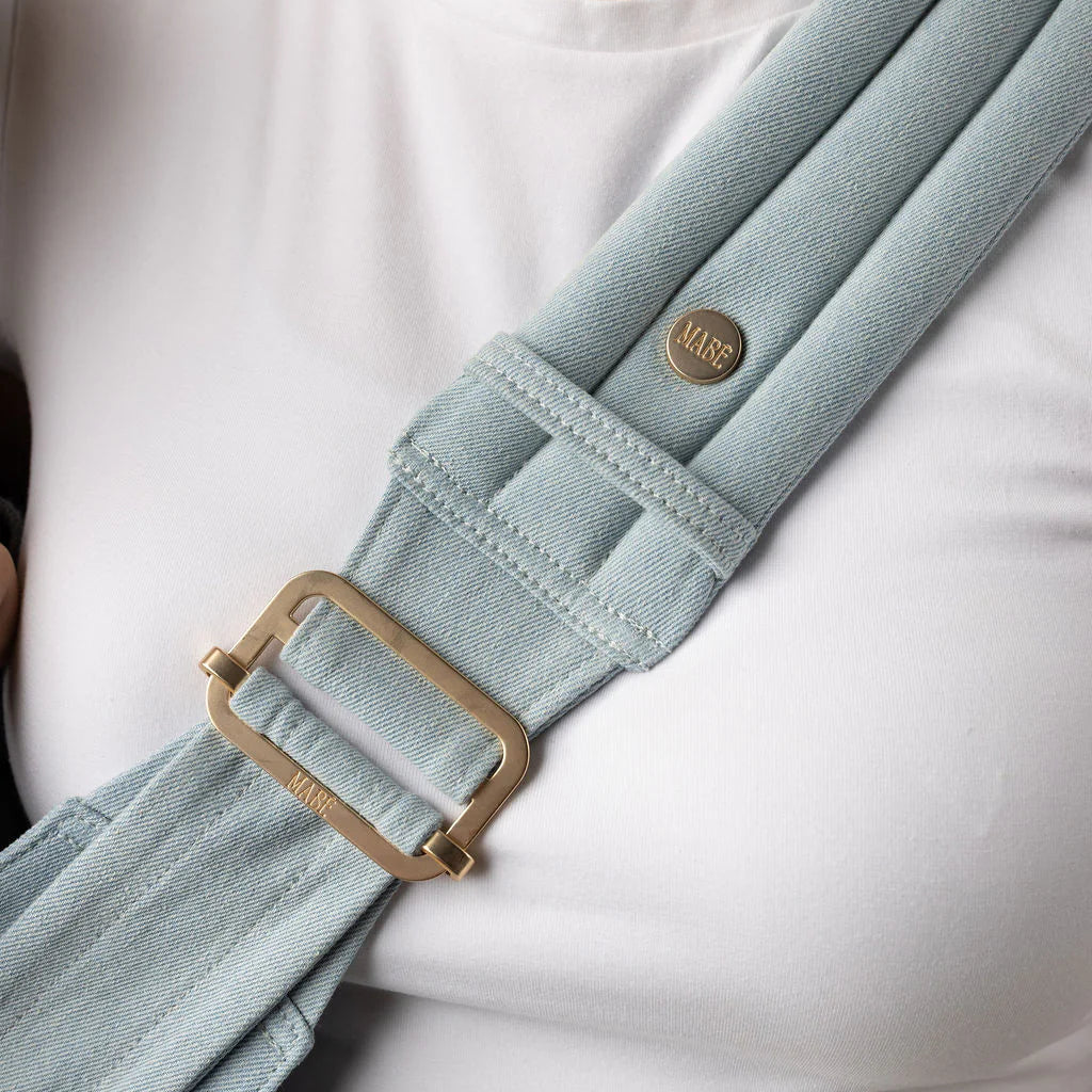 Mabē Monarch Toddler Sling - Dream Wash Denim Carrier Lifestyle 4 Gold Hardware Detail