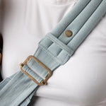 Mabē Monarch Toddler Sling - Dream Wash Denim Carrier Lifestyle 4 Gold Hardware Detail