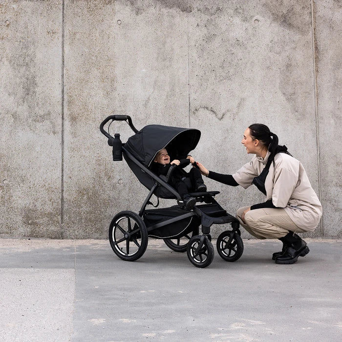 Thule Urban Glide 4-Wheel Stroller - Black on Black Lifestyle