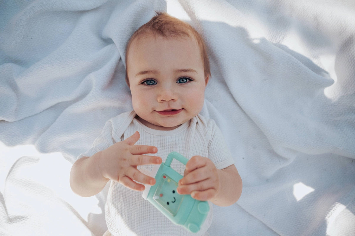 Tucker the Tumbler - Itzy Ritzy Sweetie Shake Plus Rattle & Teether Lifestyle