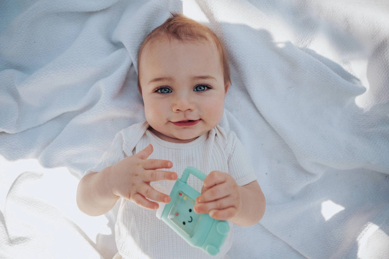 Tucker the Tumbler - Itzy Ritzy Sweetie Shake Plus Rattle & Teether Lifestyle