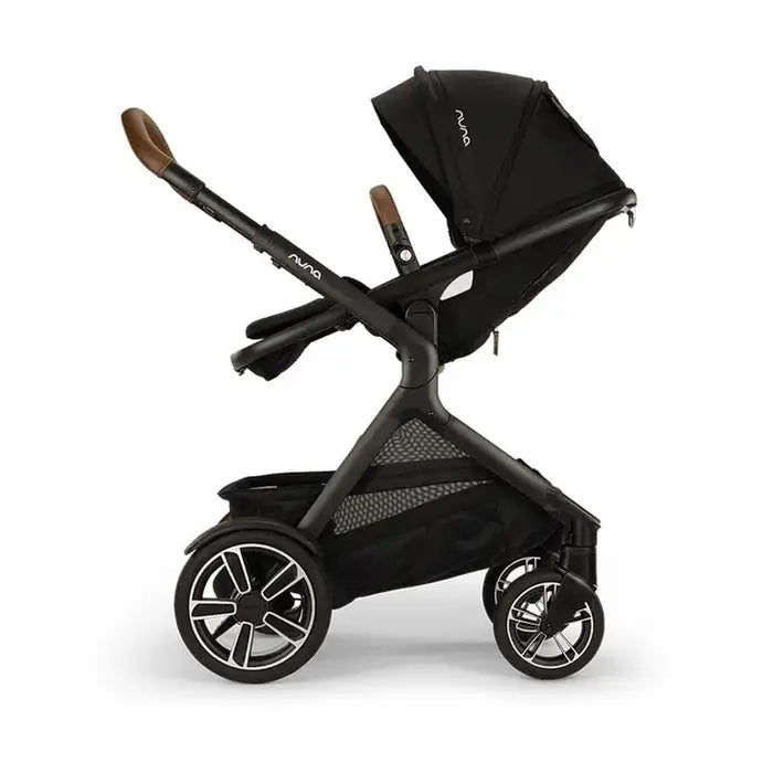 DEMI™ Next Stroller with Rider Board in Caviar Side Profile Parent Facing