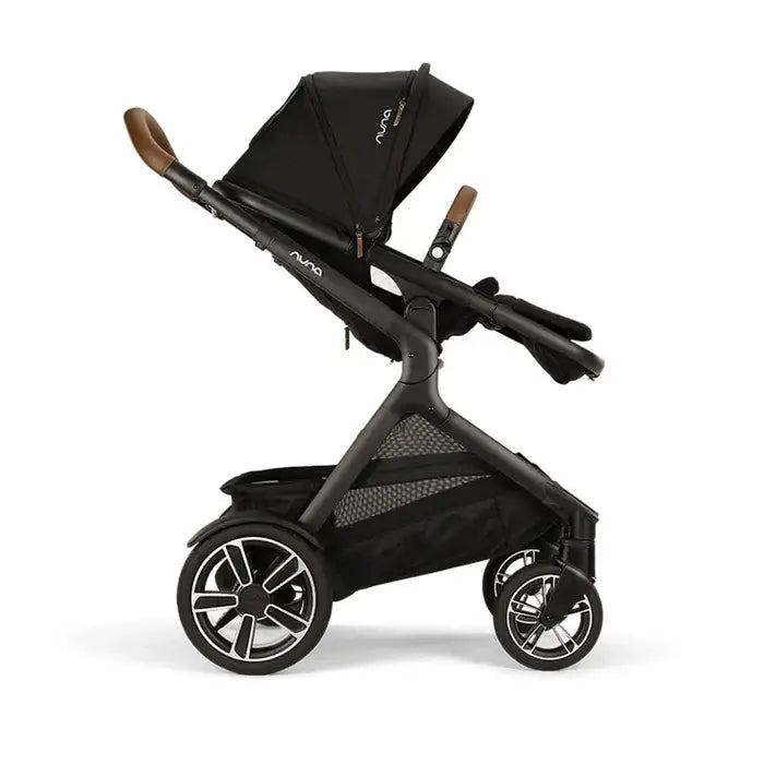 DEMI™ Next Stroller with Rider Board in Caviar Side Profile World Facing