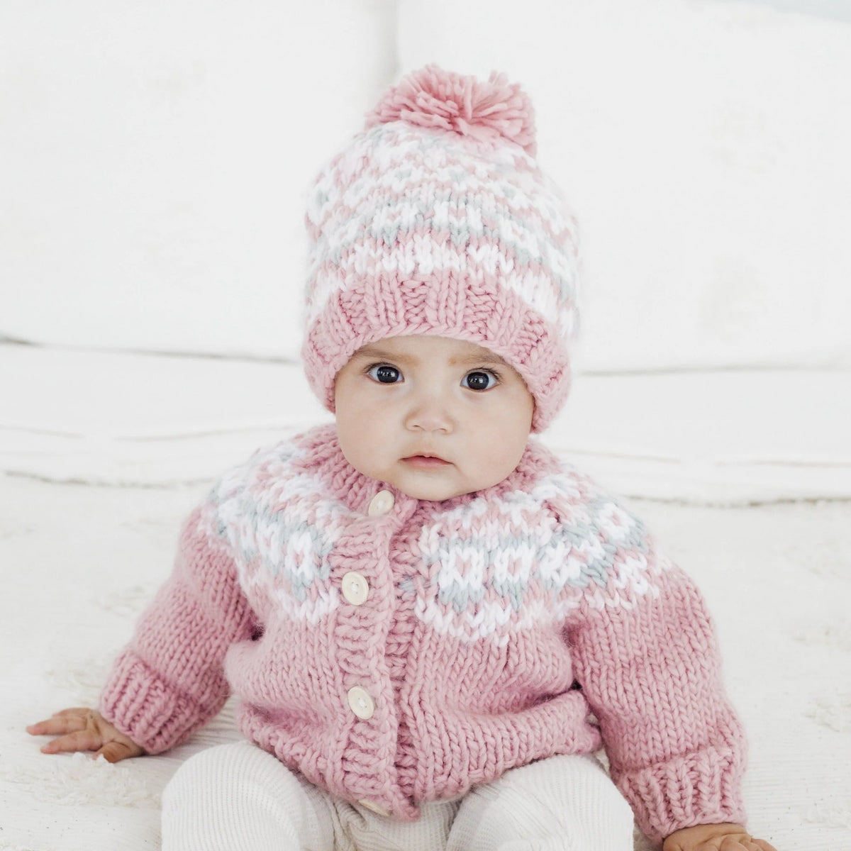 Huggalugs Fairisle Rosy Beanie Hat Lifestyle 2 with Fairisle Rosy Knit Cardigan Sweater