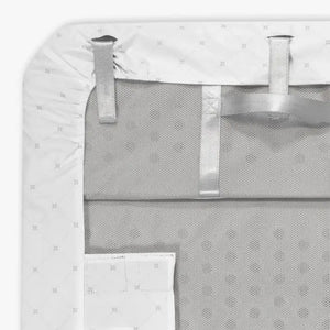 UPPAbaby Remi Waterproof Mattress Cover - Lifestyle with Secure Sheet Attachments